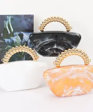 The Crowned Curve Clutch